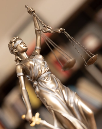 Mature person signing the financial contract in modern office